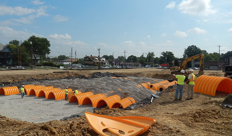 Excavating - orange pipe - horizontal 21w x 16h